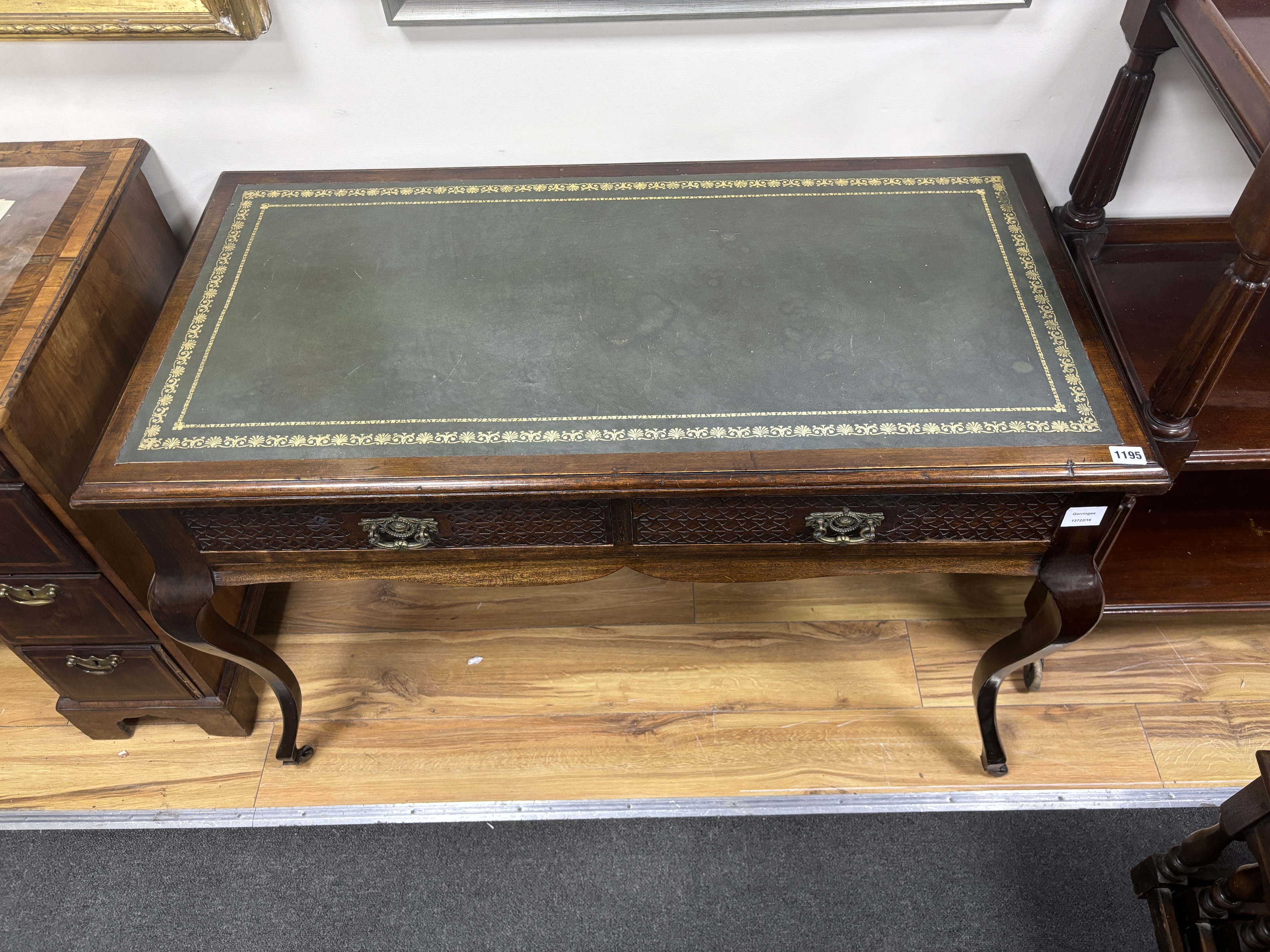 A late Victorian mahogany two drawer writing table, width 110cm, depth 54cm, height 73cm